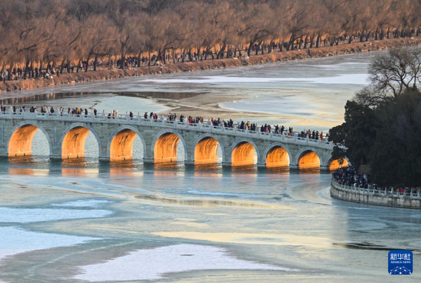 冬至日颐和园十七孔桥现“金光穿洞”美景插图1中国题字网